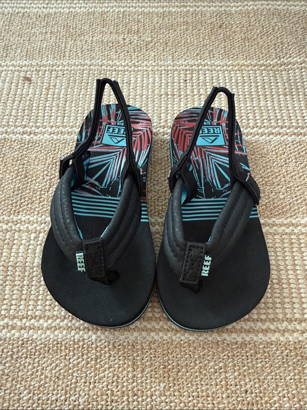 Reef Black Sandals with Teal and Coral Palm Insole